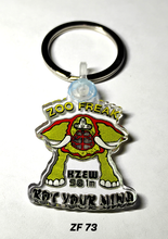 Load image into Gallery viewer, Colorful KZEW keychains featuring artistic designs, attached to metal key rings for everyday use and decorative display.
